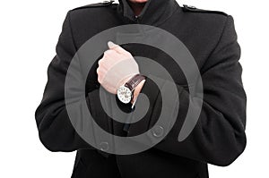 Close-up of elegant man posing wearing overcoat