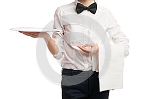 Close-up of elegant waitress holding tray and towel