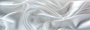 Close up of elegant white silk fabric with slight crumpling luxury background texture design