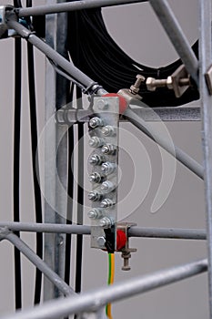 Close-up of element of mobile communication antenna construction. Industrial background