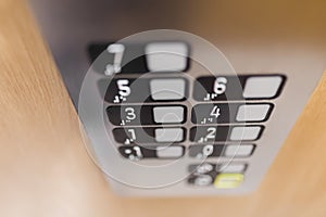 Close up of elevator control panel buttons