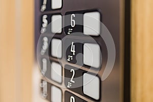 Close up of elevator control panel buttons