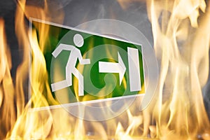 Close-up Of Emergency Fire Exit Board