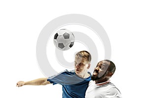 Close up of emotional men playing soccer hitting the ball with the head on isolated on white background