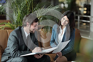 Close up. employees of the company discussing financial documents.