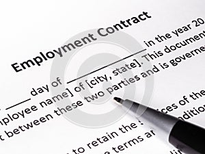 Close-up of Employment contract form with pen.