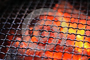 close up of Empty Barbecue Flaming Charcoal Grill With Bright Fire , Food Background Or Texture. Copy Space