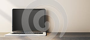 Close up of empty computer monitor on simple wide wooden desk. Workplace concept.3D Rendering