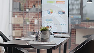 Close up of empty desk used for business meeting in office