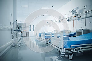 Close-up of empty hospital room with bed.