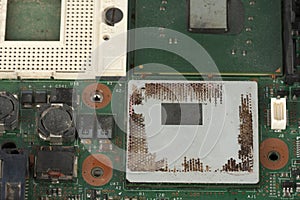 Close up empty socket for CPU and  integrated graphics card on laptop main board on white background