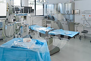 Close-up of empty surgical room with bed.