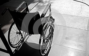 Close up Empty wheelchair from back view. free space, black and white concept.