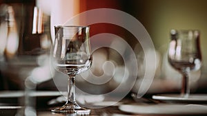 Close-up of an empty wine glass on the dining table
