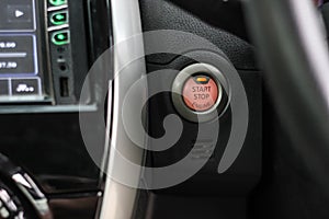 Close up engine car start button.