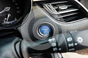 Close up engine car start button.