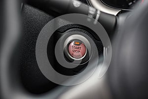 Close up engine car start button.