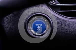 Close up engine car start button. Start stop engine modern new car button