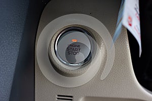 Close up engine car start button. Start stop engine modern new car button