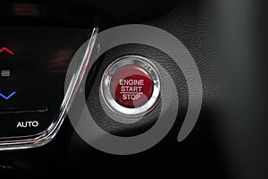 Close up engine car start button. Start stop engine modern new car button