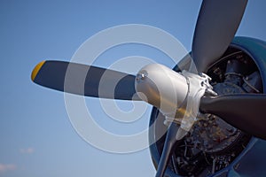 Close up of the engine and propeller of a vintage World War II fighter airplane