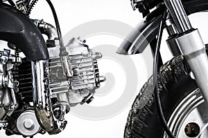 Close up of engine on vintage motorcycle. Custom scrambler motocross. Retro motorbike on white background. photo