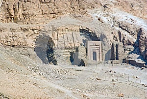 .- Close-up of the entrance of a tomb excavated on the side of a
