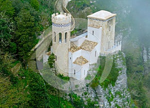 Close up of Erice small castle in the fog in the unique town of Sicily - Italy
