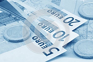 Close up of euros (blue toned)