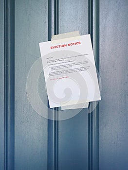 Close up of Eviction Notice on door of home focus of sign