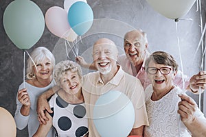 Close-up of excited pensioners