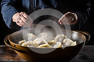 Close-up of expert hands making delicious homemade dumplings with precision and skill