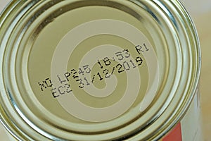 Close-up of 2019 expiration date on canned food