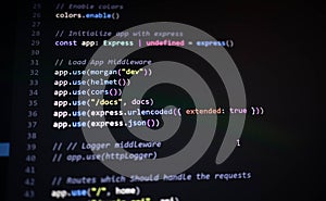 Close-up of Express.js middleware setup in JavaScript backend, showing secure configuration using Helmet, CORS, Morgan, and body