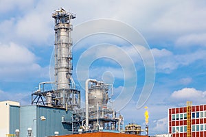 Close up exterior strong metal structure of oil refinery plant in heavy industry