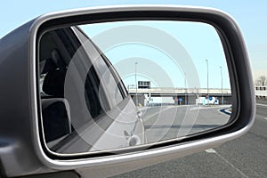 Close up on a  external car rear mirror with clipping path