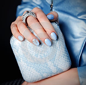 Close-up of an extravagant clutch bag photo