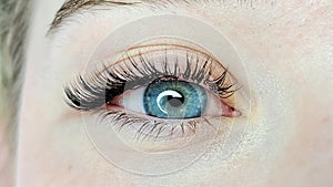 Close up of eye with eyelash extensions ,beauty salon treatment ,