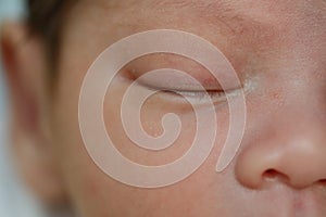 Close up eye of newborn baby sleeping sweet dream