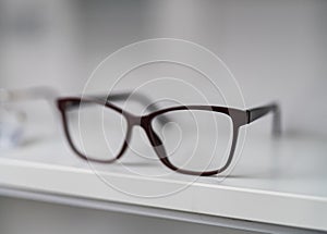 Close up of eyeglasses on the table. Corrective eyesight lenses.