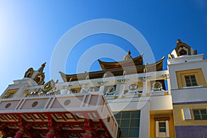 Close up on the facade of the Buddhist temple Golden Abode of Buddha
