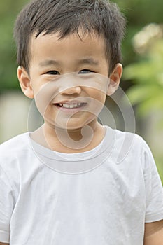 Close up face of asian children looking to camera