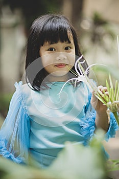 Close up face asian girl children toothy smiling face happiness emotion looking to camera