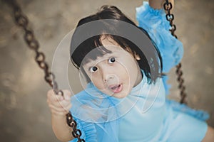 Close up face asian girl children toothy smiling face happiness emotion looking to camera