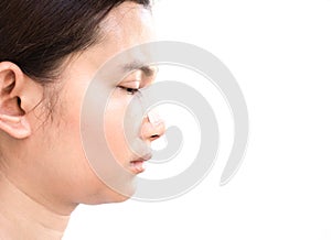 Close up face of asian woman with nose plastic surgery for beauty and cosmetic concept, white background