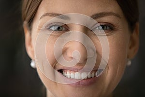 Close up face of attractive caucasian 30s woman