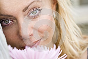 Close-up face of beautiful young blond woman