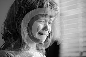 Close up Face of Crying Kid Boy. Sad Child with Tears at Home.