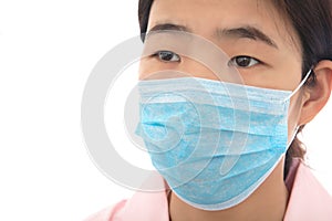 Close-up face of female nurse wearing mask