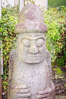 Close up face of the stone idol (Dolharubang, the grandfather s
